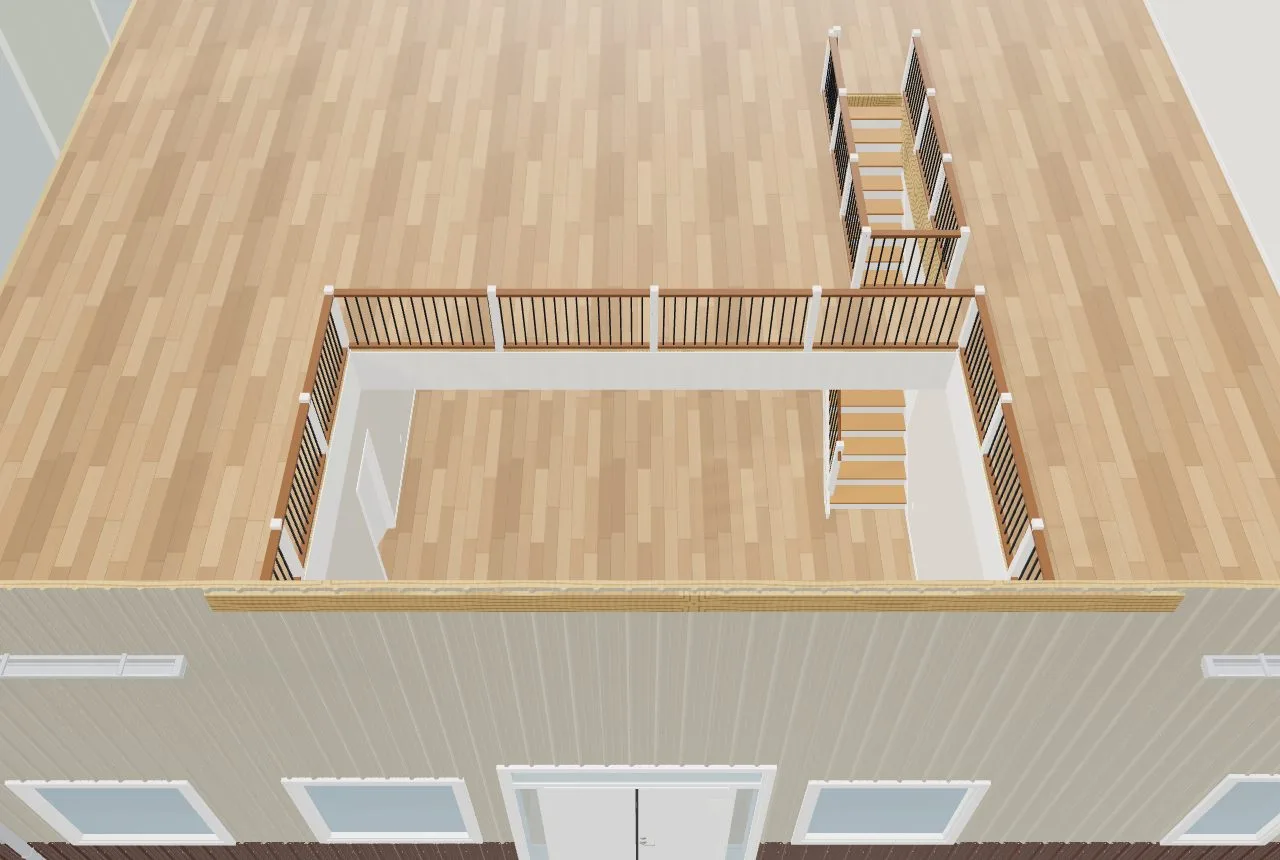 A room open to below: the second floor with a guarded balcony round the opening and the stair landing at it