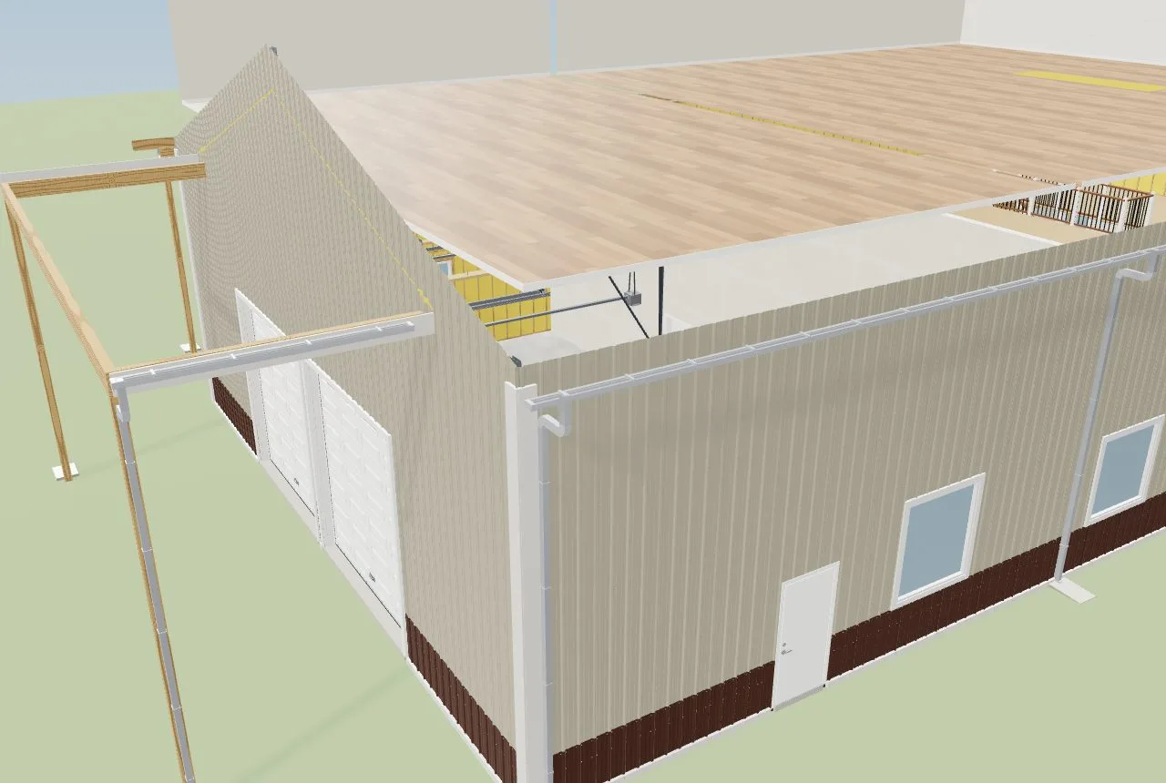A second floor that stops at the shop wall: the shop stays open to the roof so its overhead doors and tracks fit
